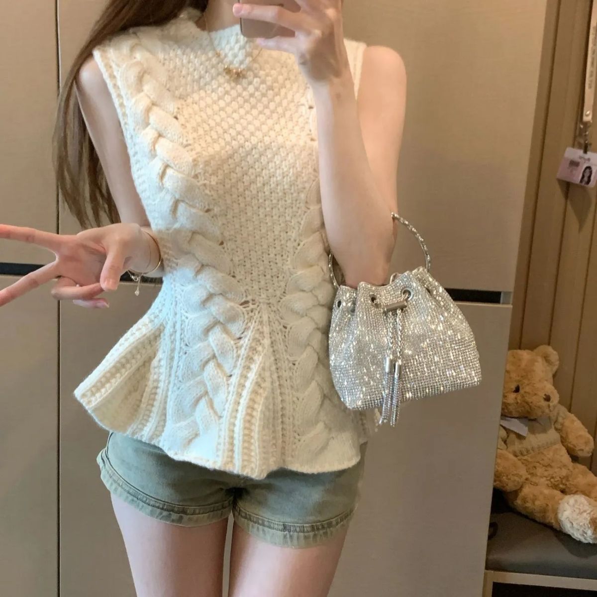 Knitted Chic Waist-Cinching Cable-Knit Sleeveless Vest Viral Finds Hub